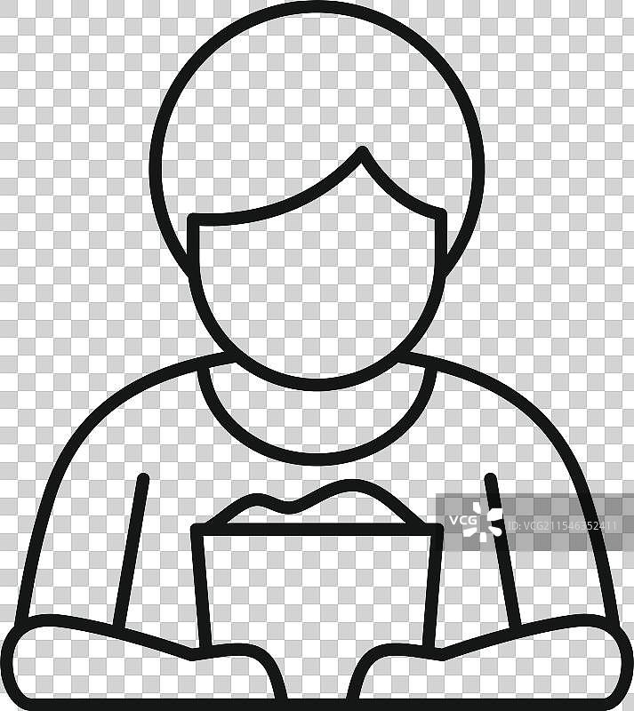 男孩在电影院里从桶里吃爆米花图片素材