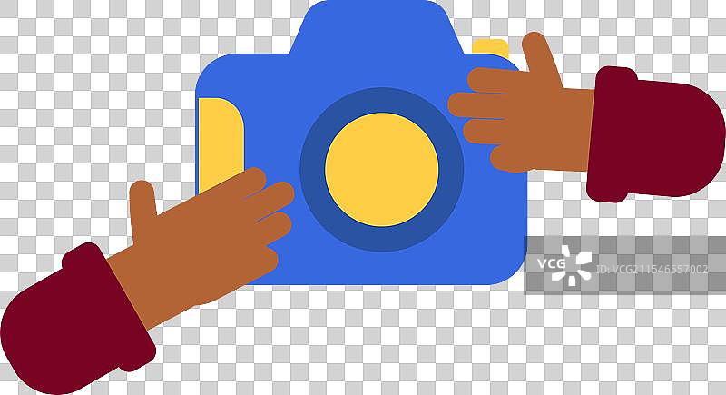 手拿着五彩斑斓的相机拍照图片素材