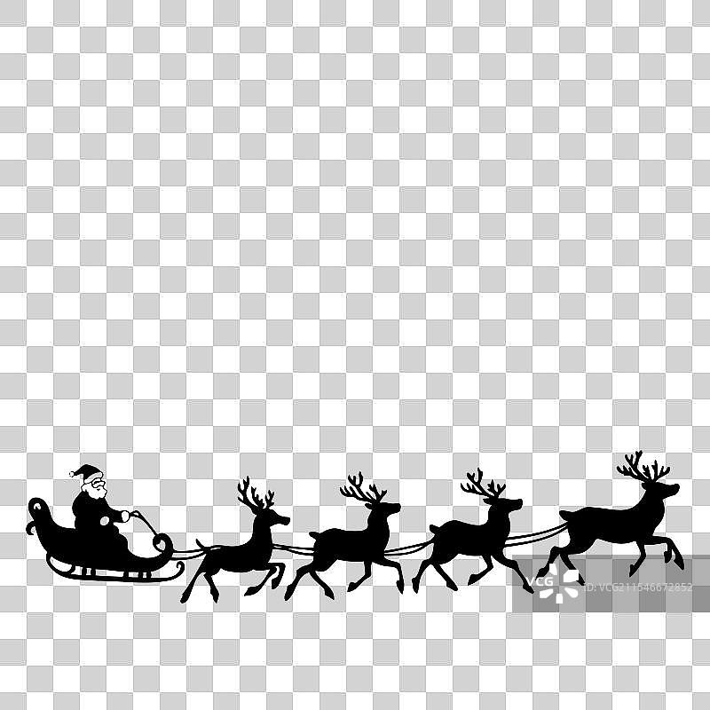 圣诞老人坐在雪橇上，被驯鹿拉着图片素材