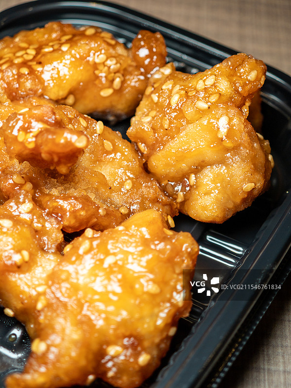 外卖糖醋芝麻鸡块图片素材