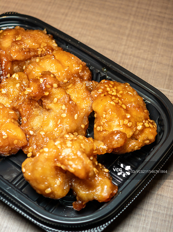 外卖糖醋芝麻鸡块图片素材