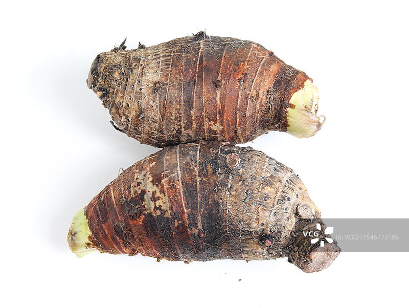 白色桌面上摆放着的新鲜美食芋头香芋图片素材