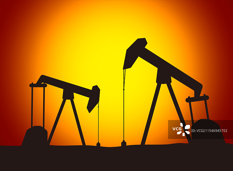 日落中的石油泵工业设备图片素材