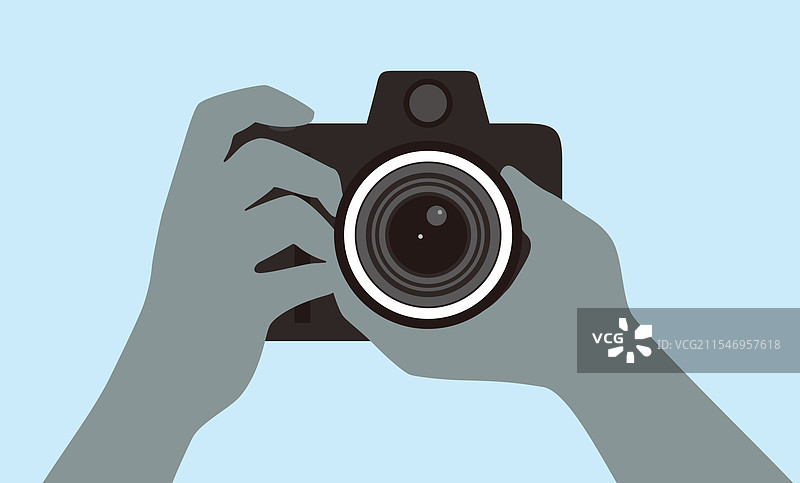 男人拿着相机拍照图片素材