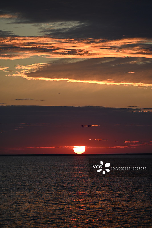 天津东疆湾日出图片素材