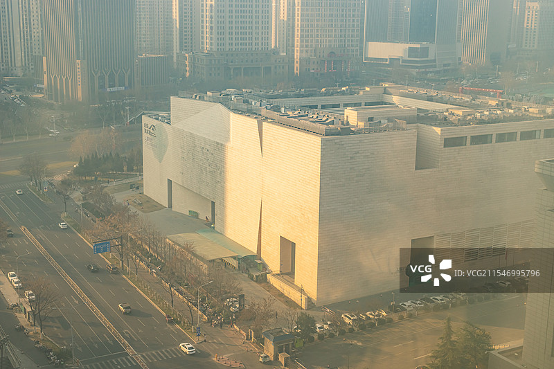中国都市风光拍摄主题，山东省美术馆济南市美术馆博物馆和周围的高楼大厦，户外白昼无人图像摄影图片素材