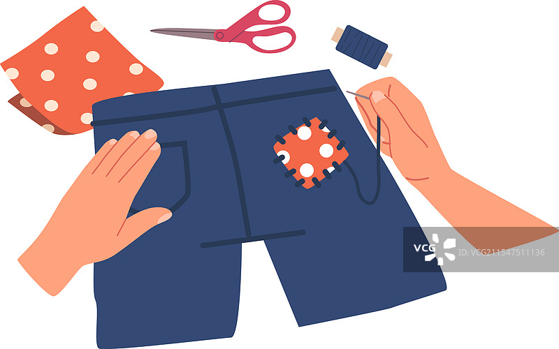 手在短裤上缝补补丁图片素材