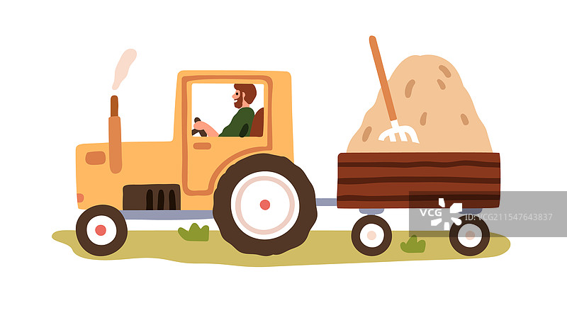 农民驾驶拖拉机，拖车上载着一堆干草。图片素材