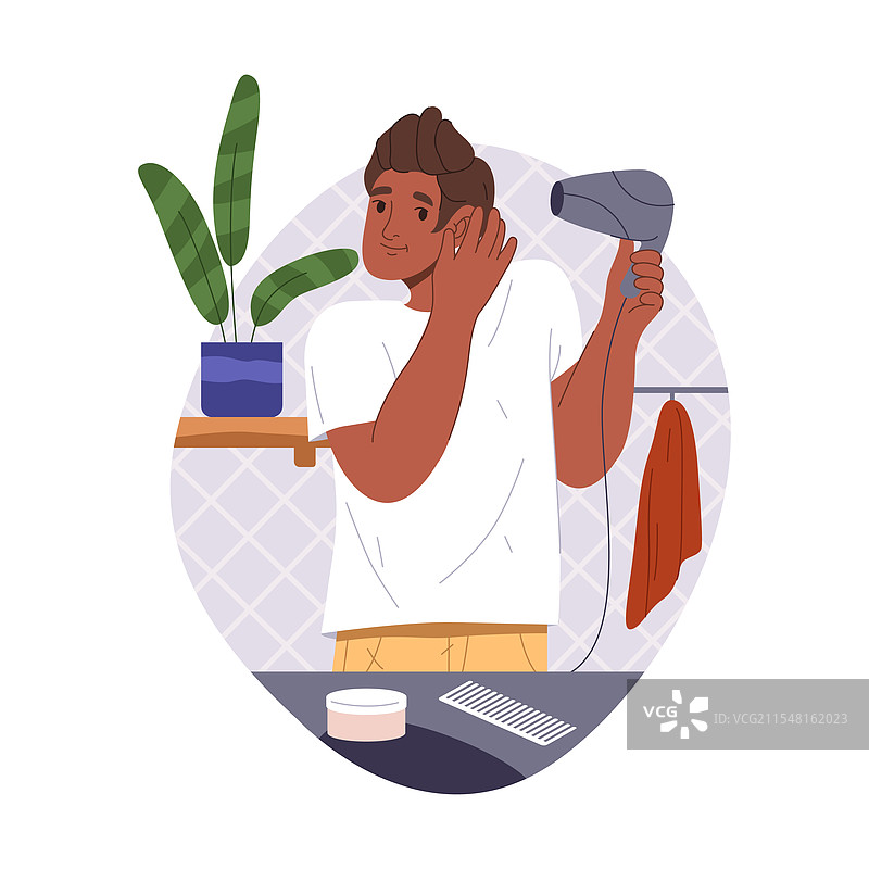 印度男子用吹风机吹干头发图片素材