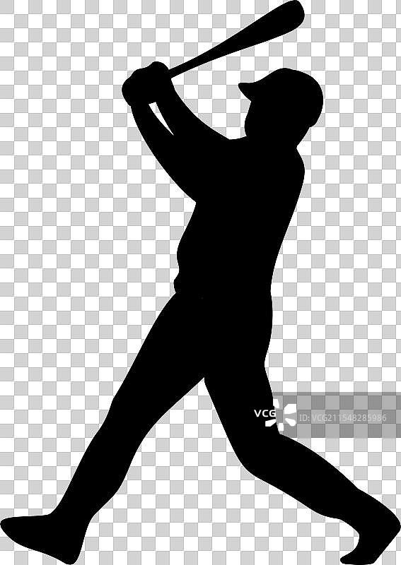 击球的棒球运动员剪影图片素材