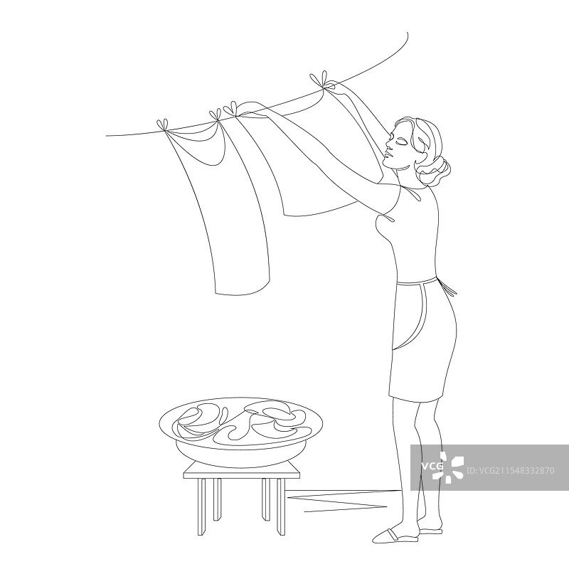 女孩的剪影在洗涤床单图片素材