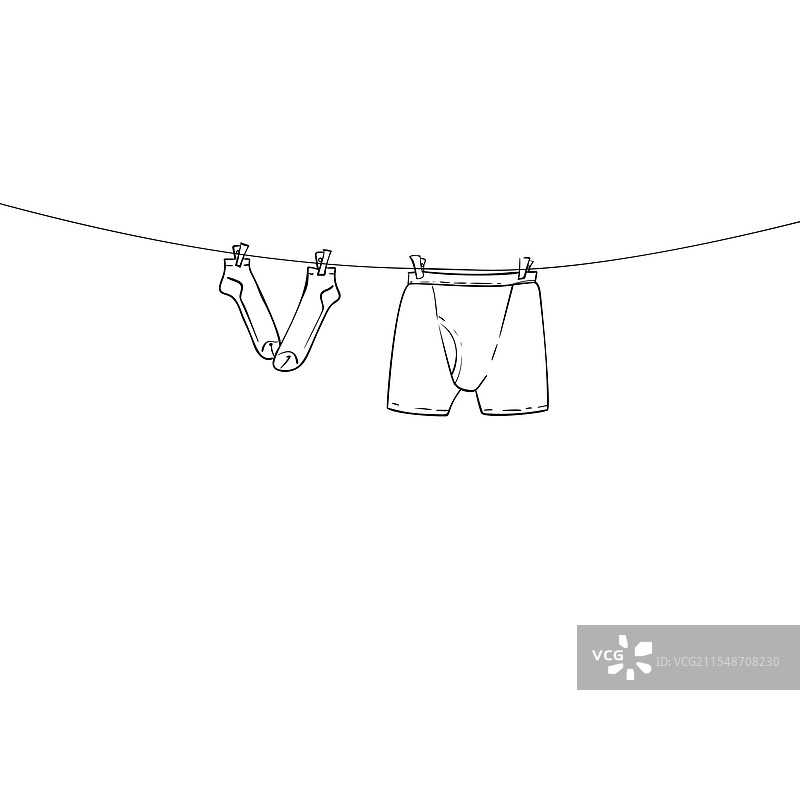 男性内裤和袜子晾在绳子上图片素材