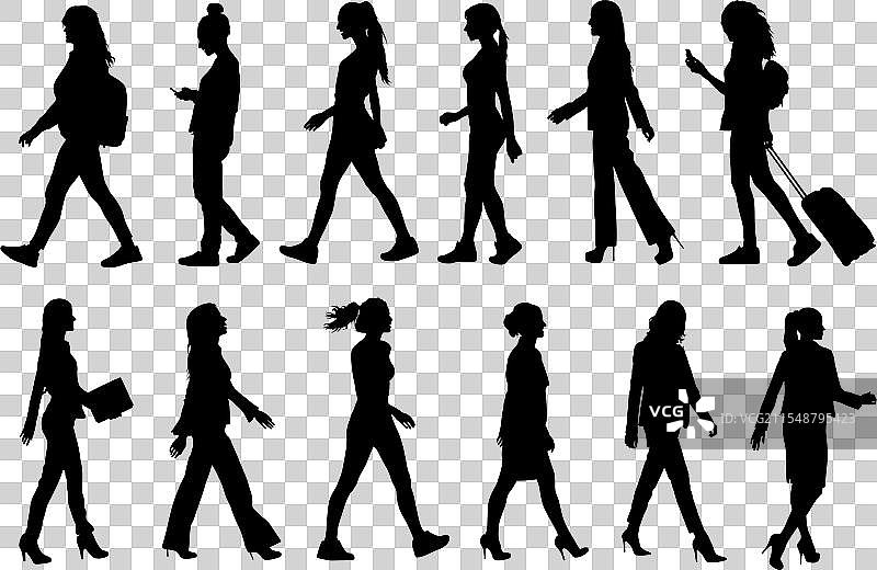 不同姿势的行走女性剪影图片素材