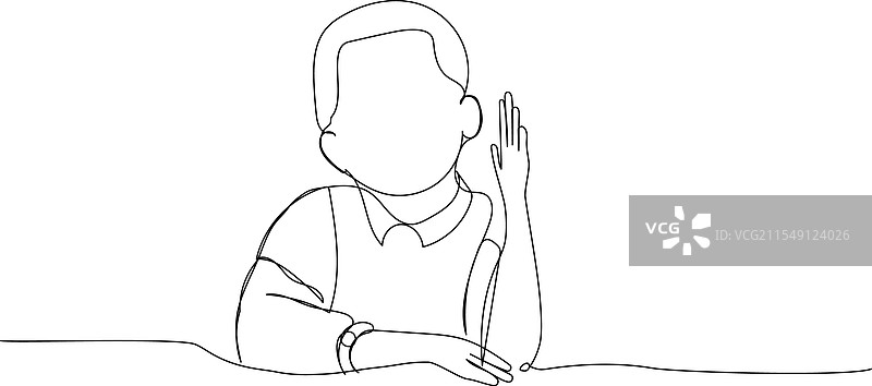 男孩在课堂上学习，举手回答问题。图片素材