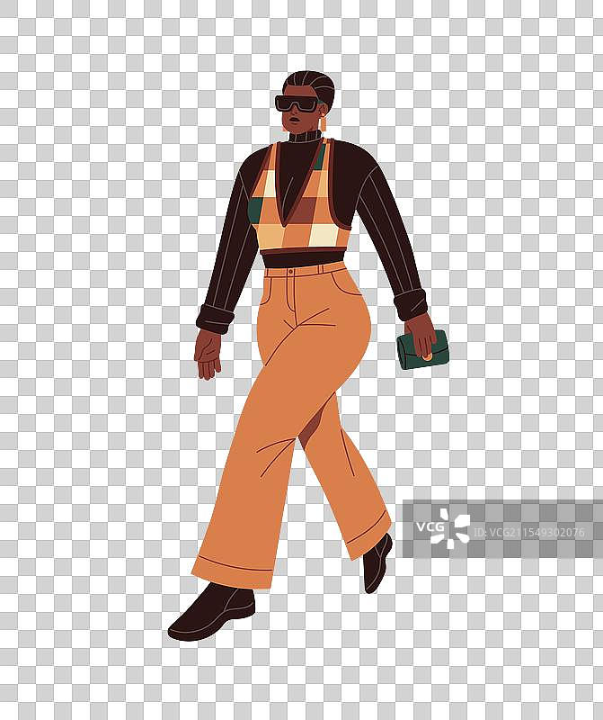 时尚的职业女性穿着潮流服装走路图片素材