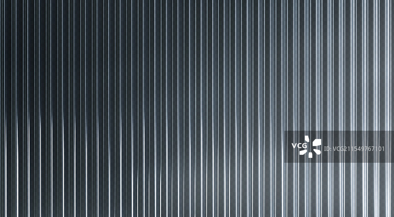 带有垂直条纹图案的波纹玻璃表面图片素材