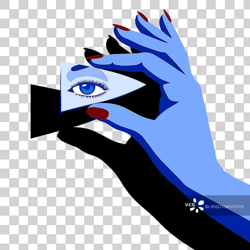 手握着一片镜子碎片，里面映出一只眼睛图片素材