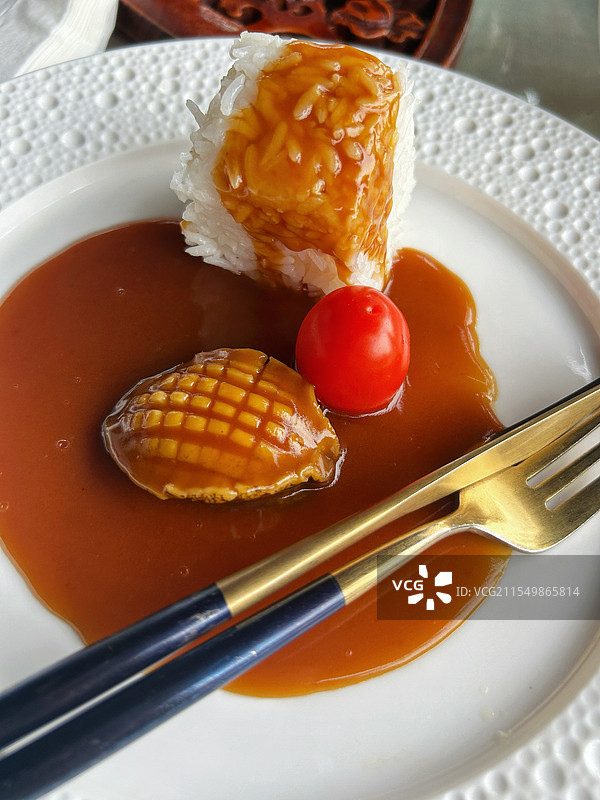 鲍鱼捞饭图片素材