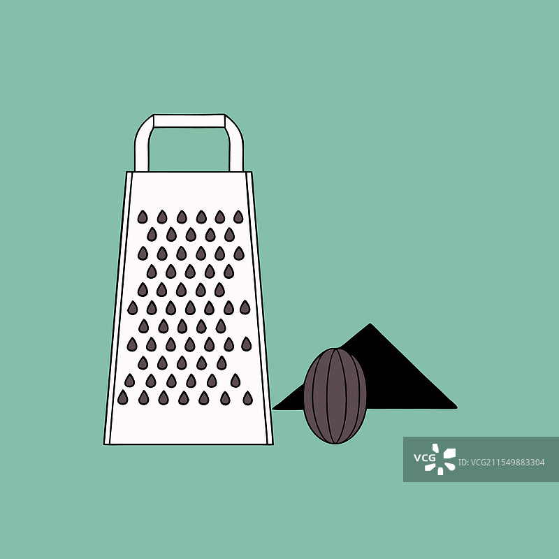 整颗肉豆蔻与一个磨碎器和一小堆图片素材