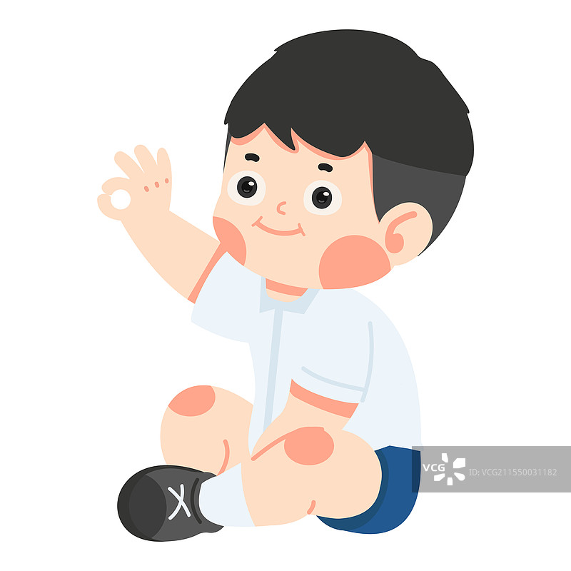 可爱的学生男孩坐着做出“好”的手势图片素材