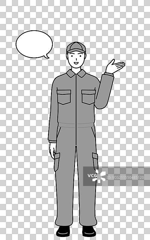 穿着工作服的机械师正在指示方向图片素材