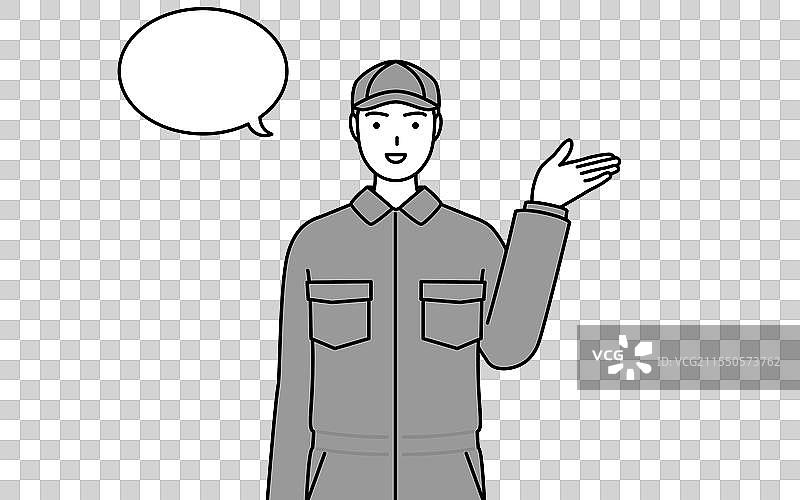 穿着工作服的机械师正在指示方向图片素材