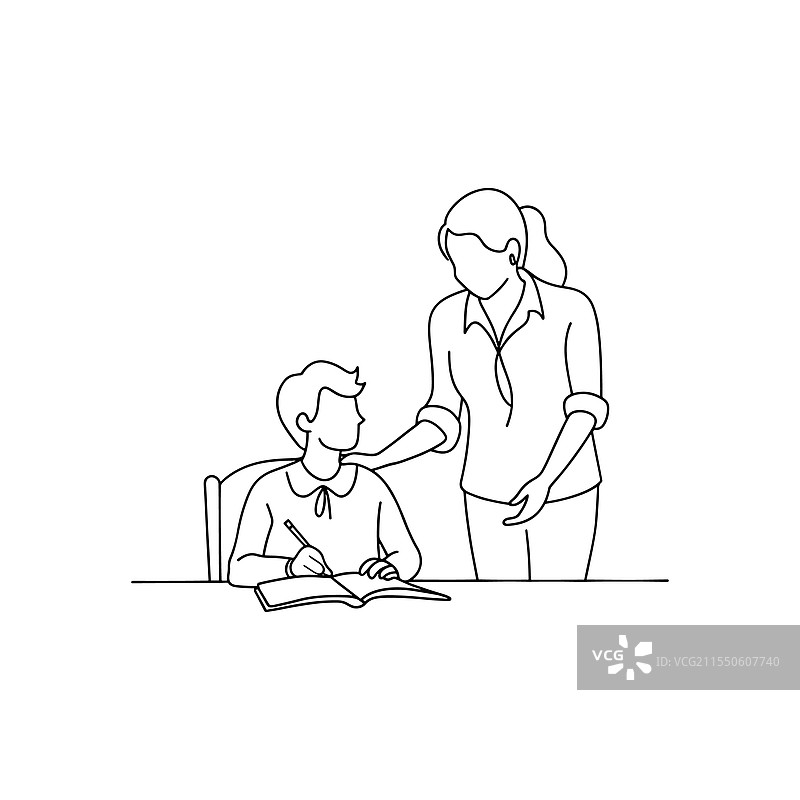 老师在教室里为学生讲解。图片素材