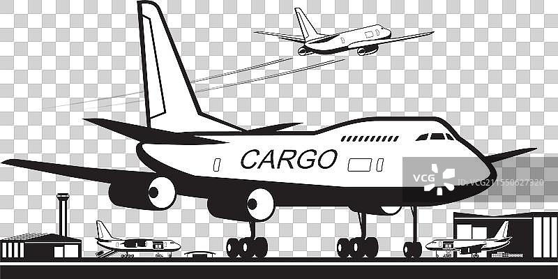 货运飞机停靠在机场航站楼图片素材