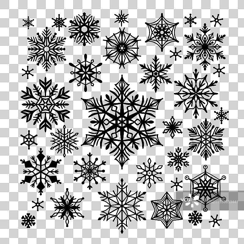 手绘雪花图案，黑色在白色背景上图片素材