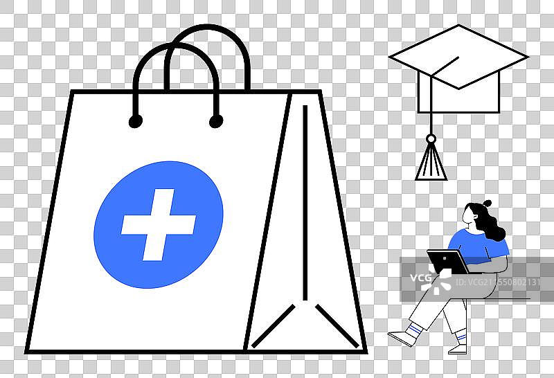 大学生坐在笔记本电脑前，身穿毕业袍。图片素材