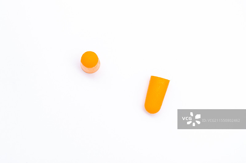 亚洲中国家庭用品拍摄主题，内室内影棚拍摄静物图像，一对黄色的防噪耳塞，室内无人图像摄影图片素材