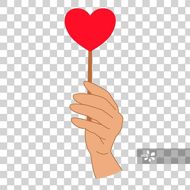 手握心形棒，象征着爱的概念图片素材