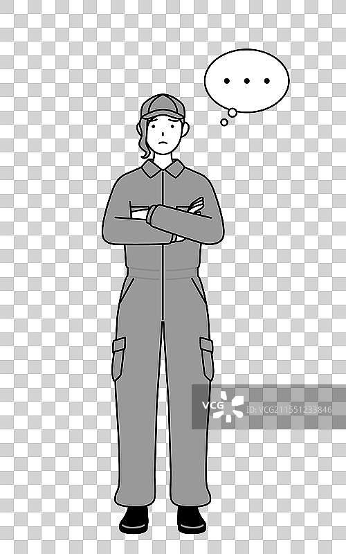 穿着工作服的女机械师双臂交叉图片素材