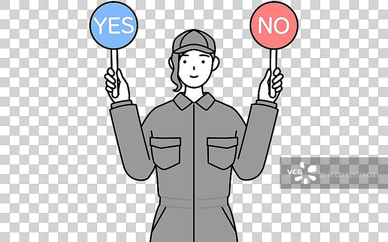 穿着工作服的女机械师手持标语牌图片素材