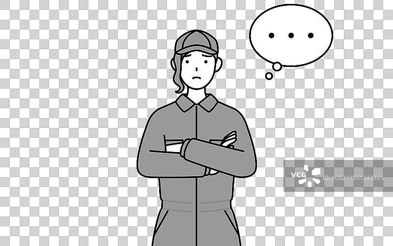 穿着工作服的女机械师双臂交叉图片素材