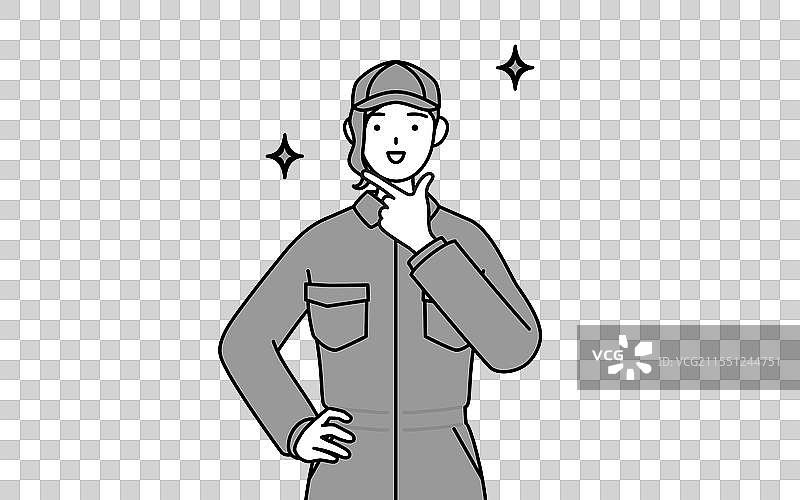 一位穿着工作服的女性机械师自信地摆姿势图片素材