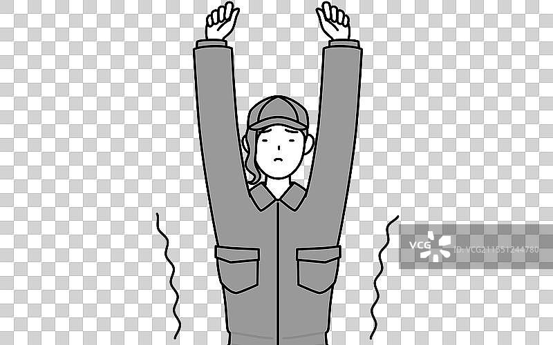 一位穿着工作服的女机械师在伸展身体图片素材