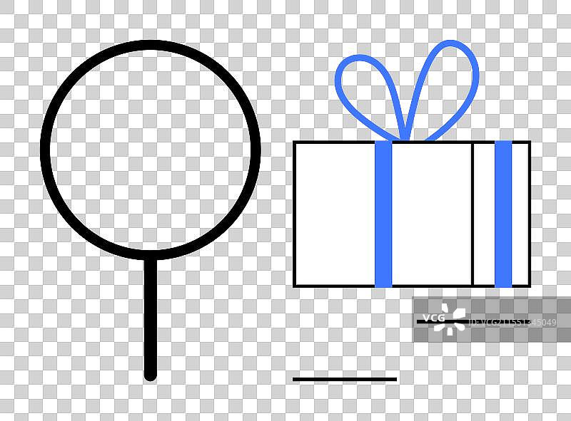 放大镜和蓝色包装的礼物盒图片素材