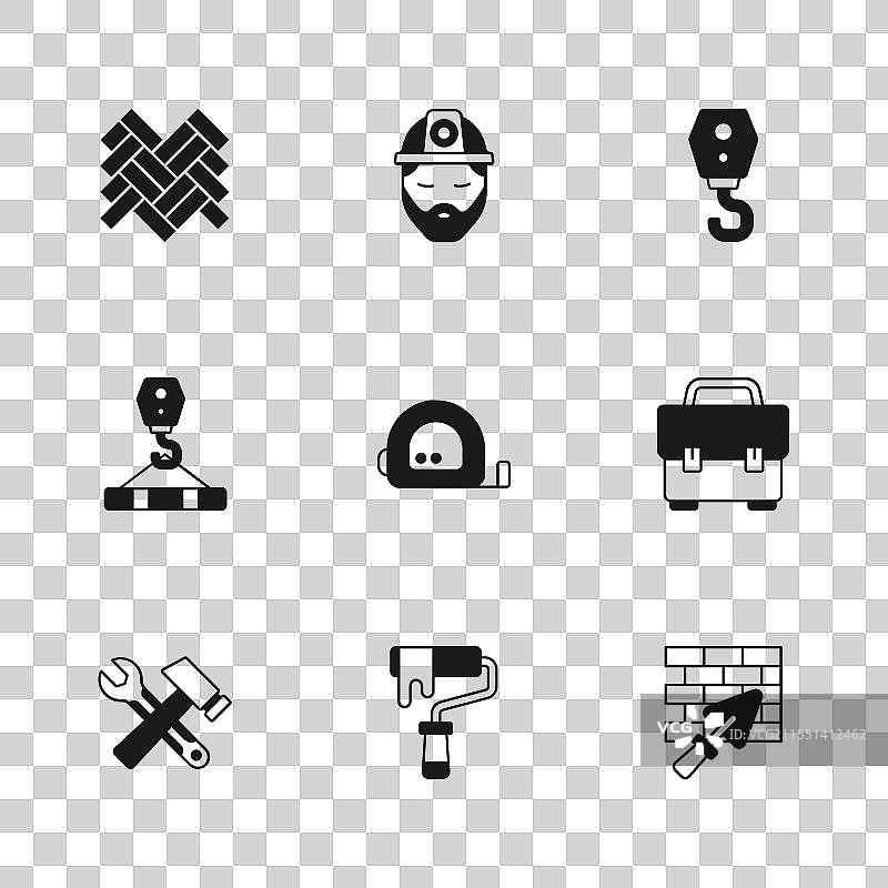 涂料滚筒刷工具箱与砖墙图片素材