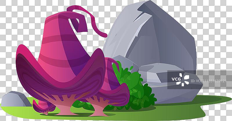 巨大的魔法蘑菇在石头附近平坦地生长图片素材