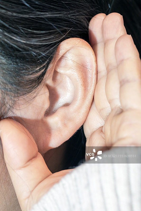 耳朵与手特写图片素材