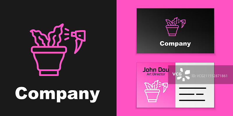 用喷枪给室内植物喷洒粉色液体图片素材