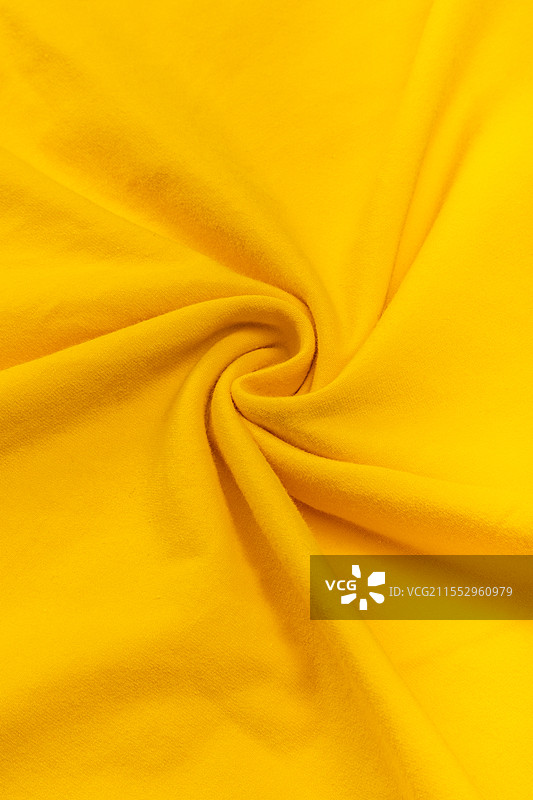 黄色螺旋的纯棉布料特写图片素材