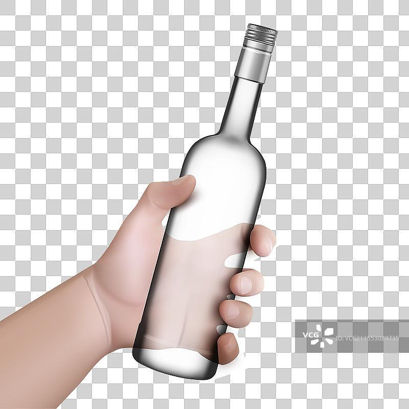 一个男人的手握着一瓶伏特加图片素材