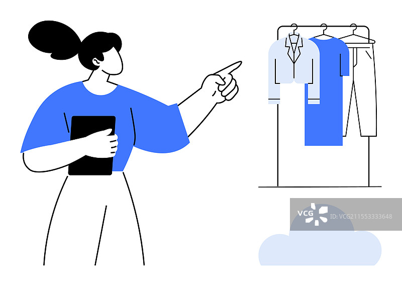 女性用平板电脑指着衣架图片素材