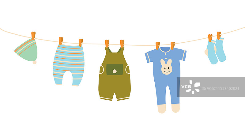 儿童衣物晾在绳子上。图片素材