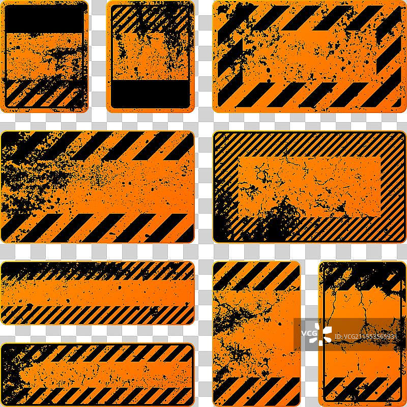 橙色磨损的警告标志与斜线图片素材