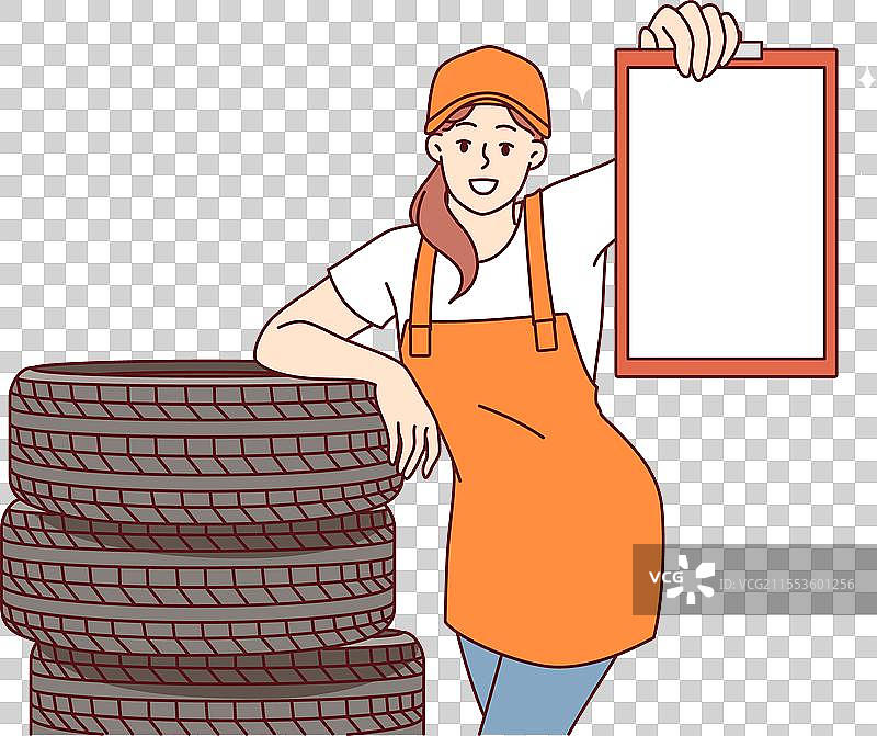 汽车修理店的女机械师站在旁边图片素材