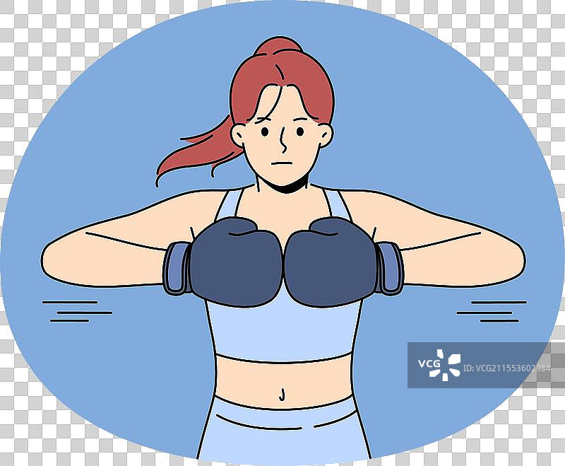 准备战斗的强壮女性，戴着拳击手套图片素材