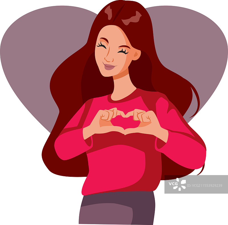 快乐的女人做出心形手势图片素材